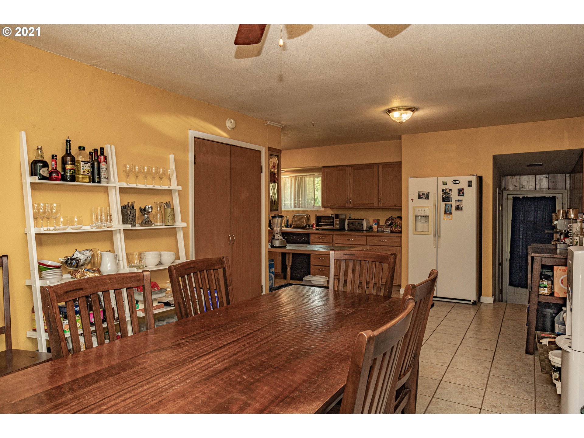 630 Northwest Gropper Road Stevenson, WA 98648 - Photo 2 of 21 a open kitchen with cabinets wooden floor and stainless steel appliances