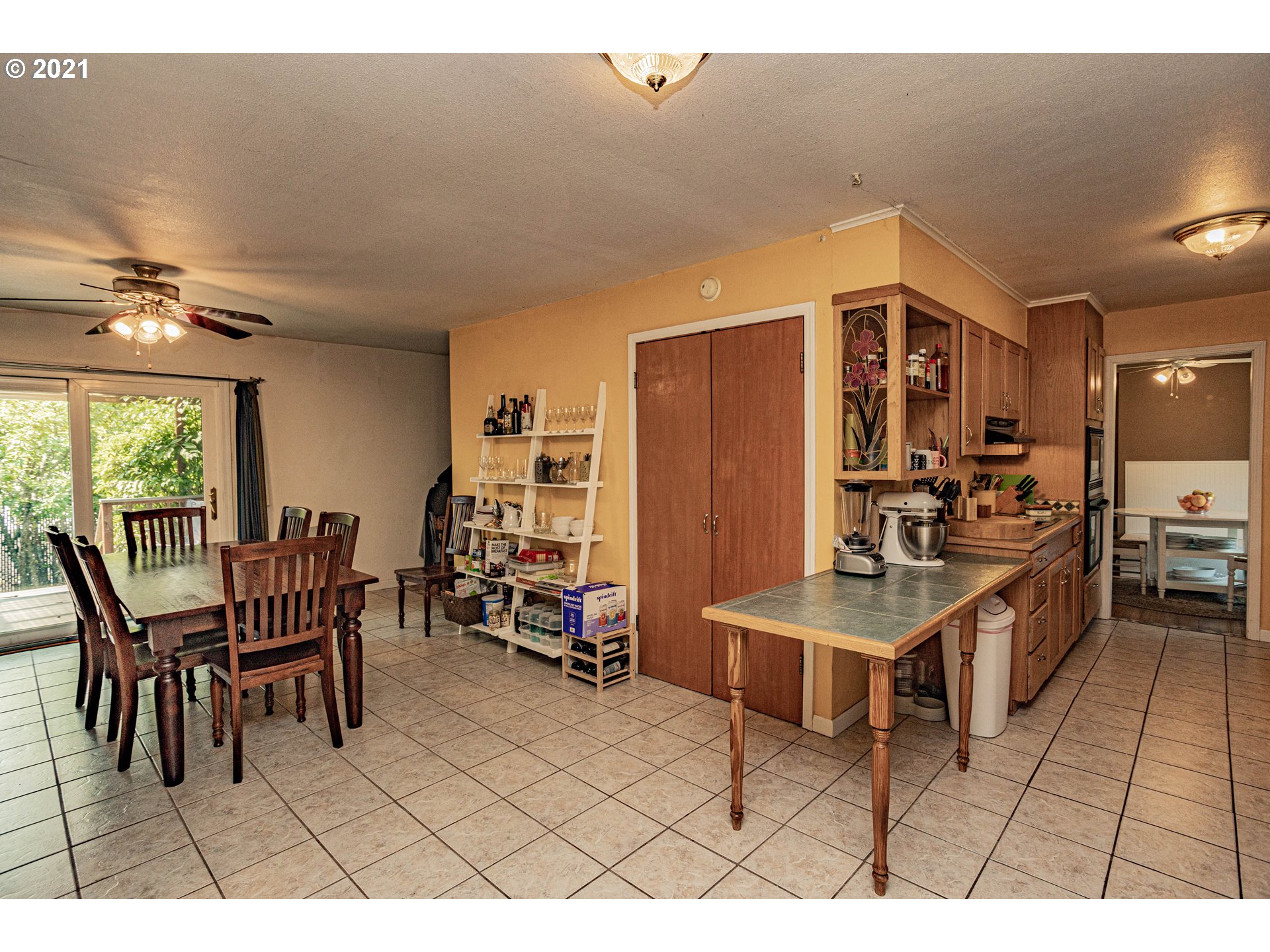 630 Northwest Gropper Road Stevenson, WA 98648 - Photo 6 of 21 a living room with furniture a flat screen tv and a table