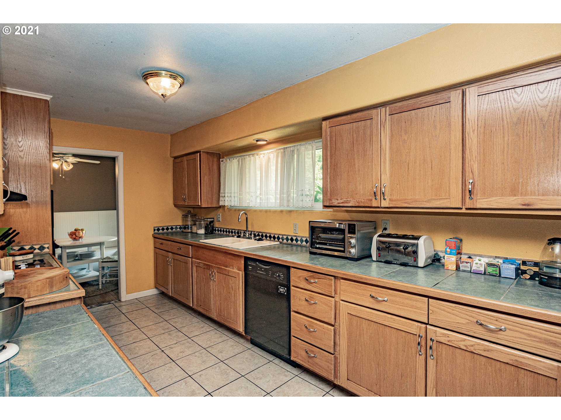 630 Northwest Gropper Road Stevenson, WA 98648 - Photo 7 of 21 a kitchen with stainless steel appliances granite countertop a sink stove and cabinets