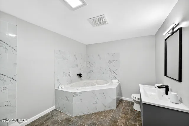 a house with trees in the background