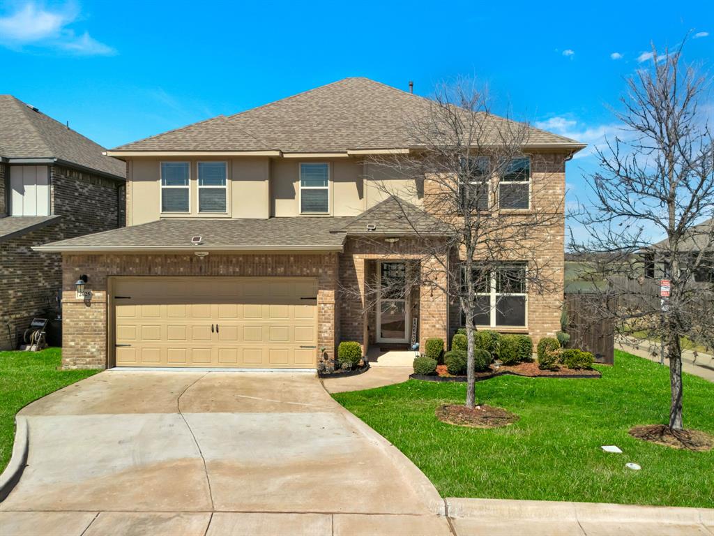 2025 Lake Front Trail Garland, TX 75043 - Photo 1 of 40 a front view of a house with a garden