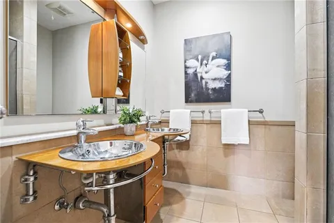 a bathroom with a shower and a toilet