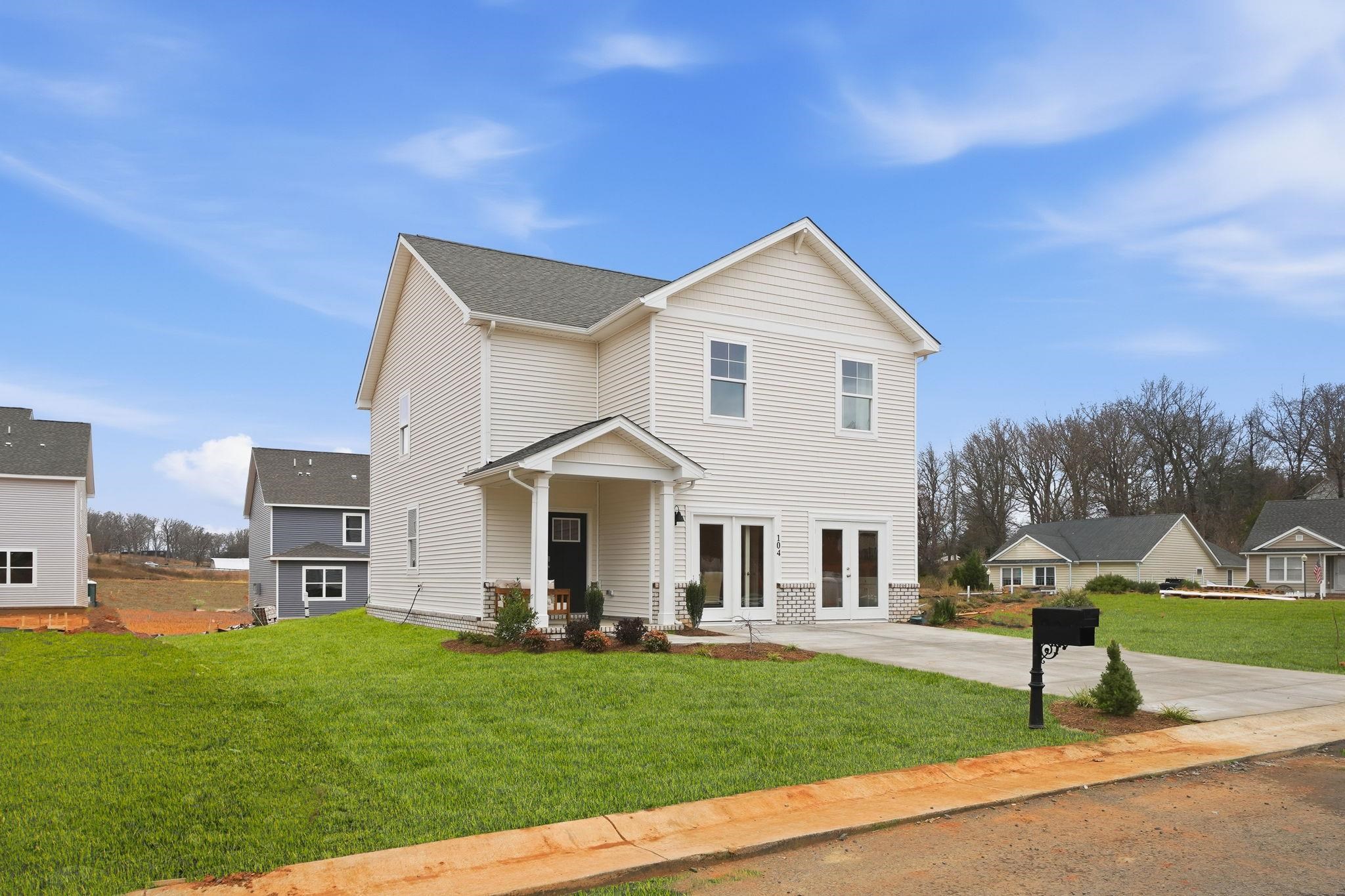109 Meadow Ridge Way Staunton, VA 24401 - Photo 2 of 29 a front view of a house with a yard