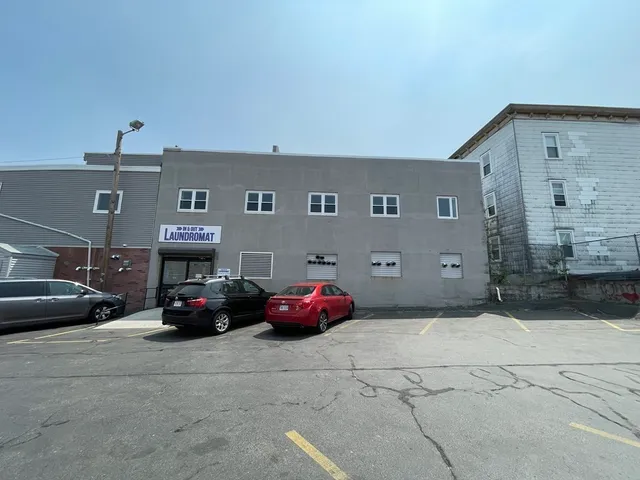 a car parked in front of a building