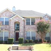 a front view of house with yard