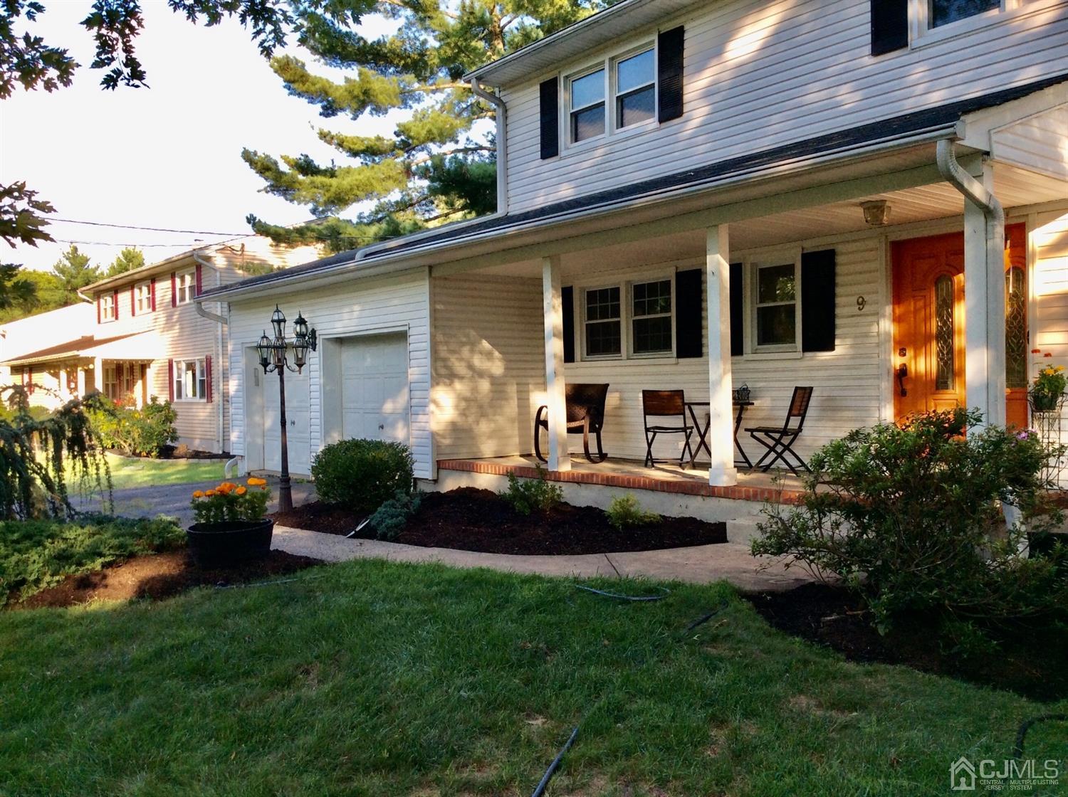 9 Devon Road Edison, NJ 08820 - Photo 1 of 58 a house view with a garden space