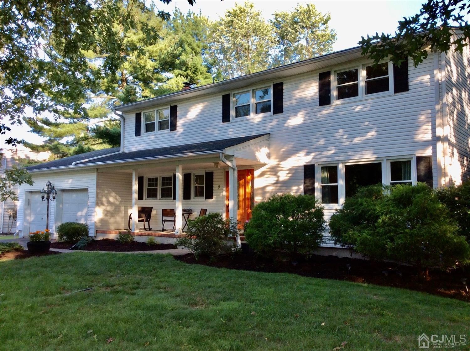 9 Devon Road Edison, NJ 08820 - Photo 2 of 58 a front view of a house with a yard and porch
