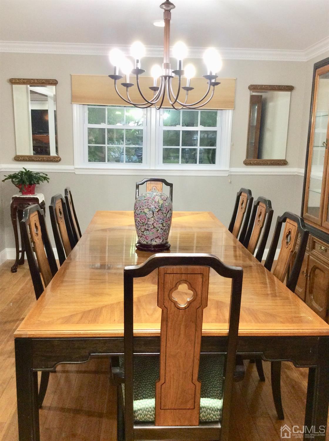 9 Devon Road Edison, NJ 08820 - Photo 16 of 58 a view of a dining room with furniture