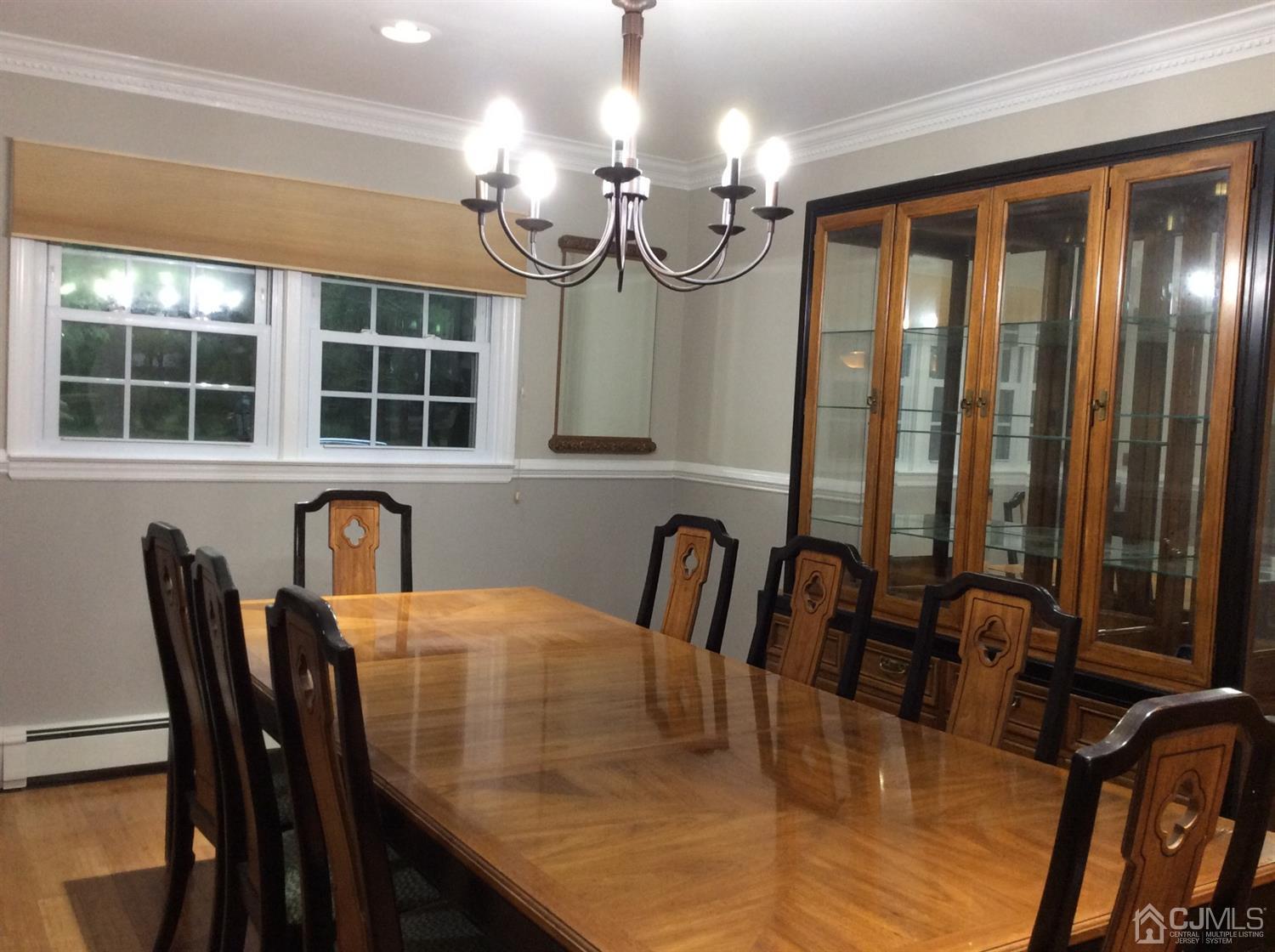 9 Devon Road Edison, NJ 08820 - Photo 17 of 58 a view of a dining room with furniture window and outside view