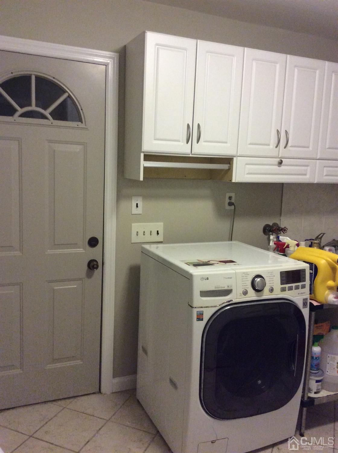 9 Devon Road Edison, NJ 08820 - Photo 20 of 58 a utility room with dryer and washer