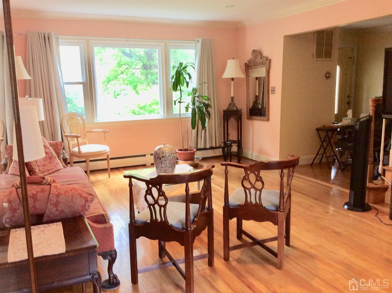 9 Devon Road Edison, NJ 08820 - Photo 34 of 58 a view of a dining room with furniture and a large window