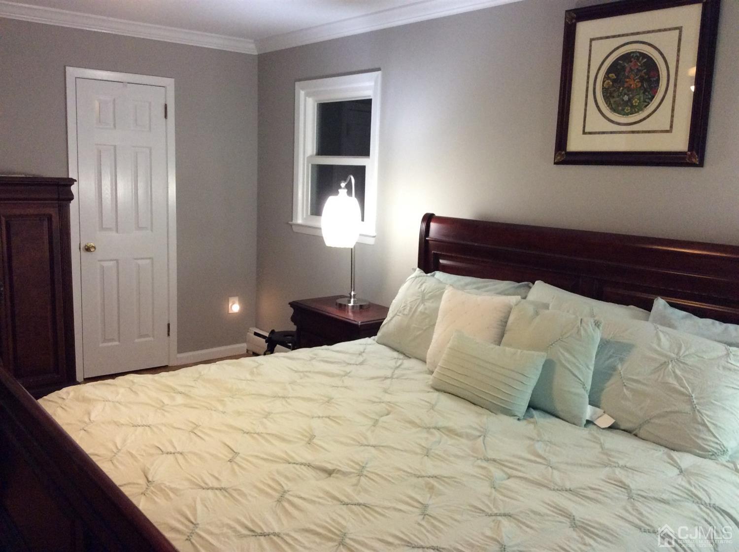 9 Devon Road Edison, NJ 08820 - Photo 53 of 58 a bedroom with a bed and a window