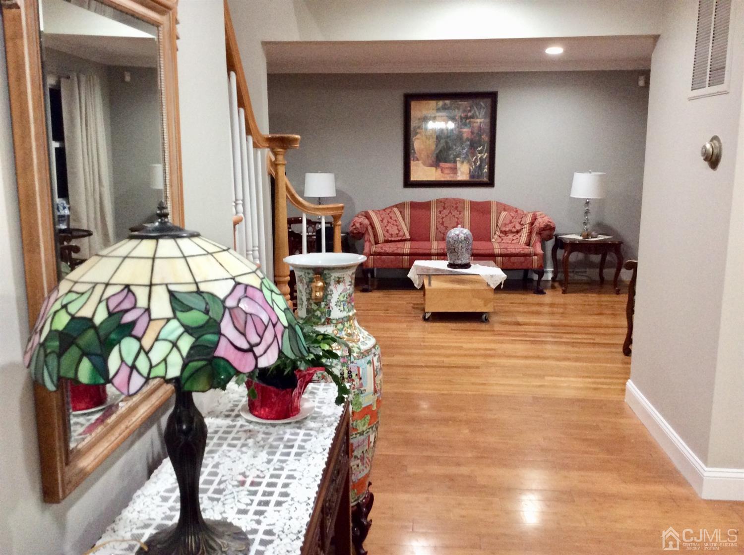 9 Devon Road Edison, NJ 08820 - Photo 7 of 58 a living room with furniture flowerpot and a potted plant