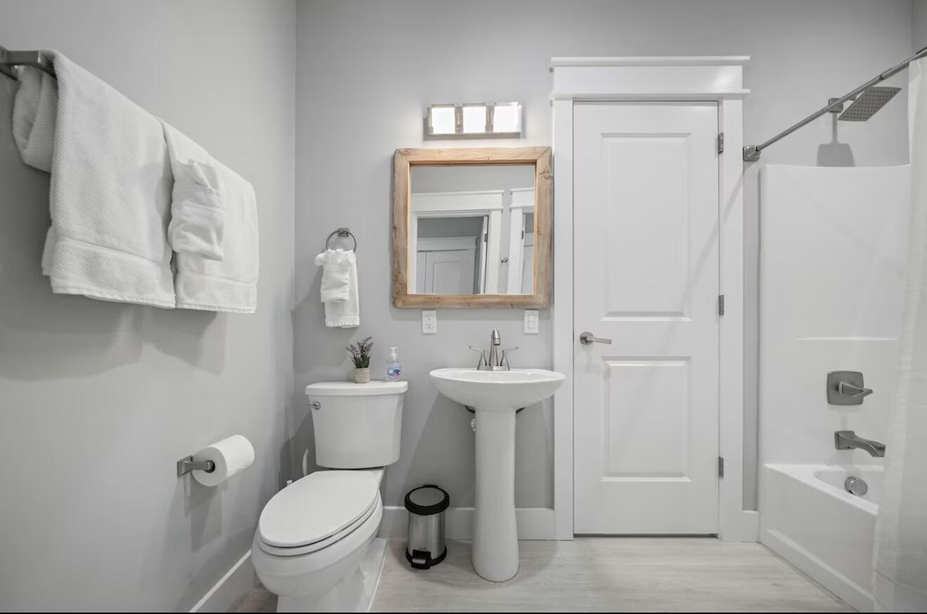37 Grande Pointe Drive Inlet Beach, FL 32461 - Photo 34 of 58 a white toilet sitting next to a bathroom sink