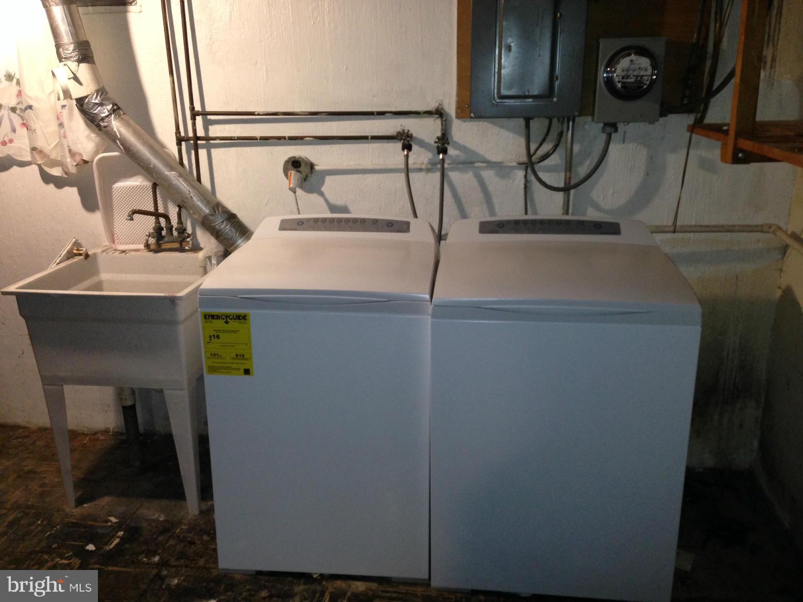 1220 Cedarcroft Road Baltimore, MD 21239 - Photo 21 of 22 a utility room with dryer and washer