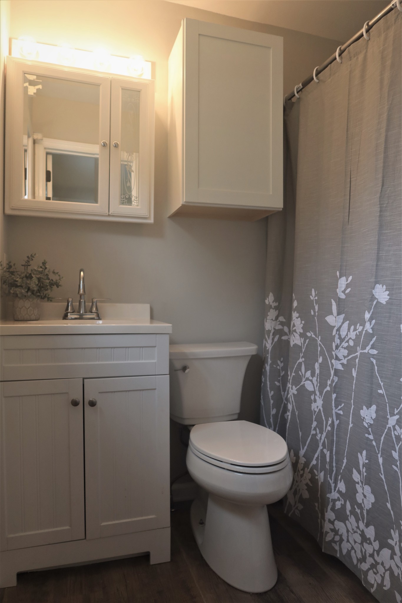 978 Riley Creek Road Tullahoma, TN 37388 - Photo 17 of 24 a bathroom with a toilet sink and mirror