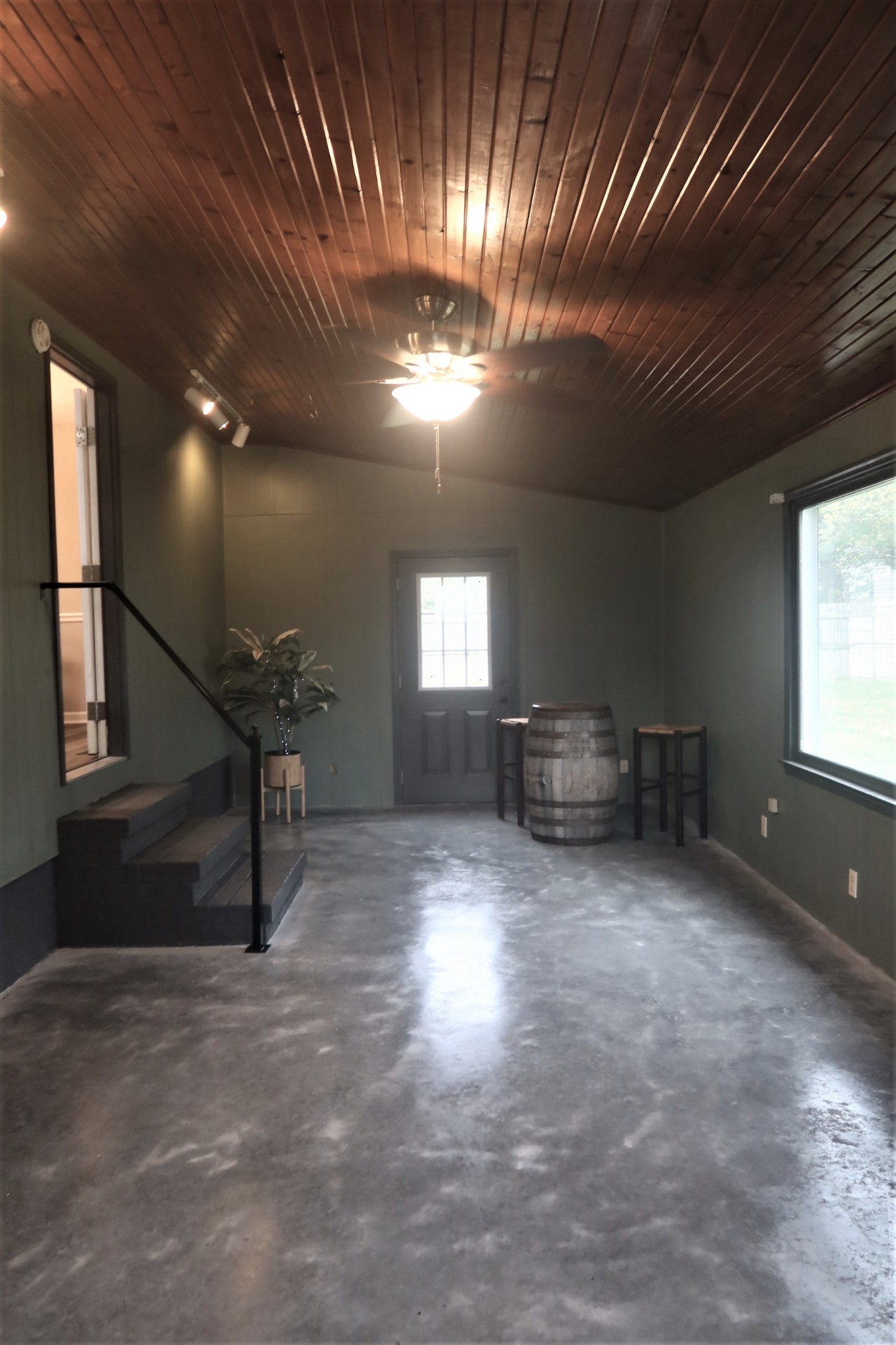 978 Riley Creek Road Tullahoma, TN 37388 - Photo 21 of 24 a view of empty room with stairs and wooden floor