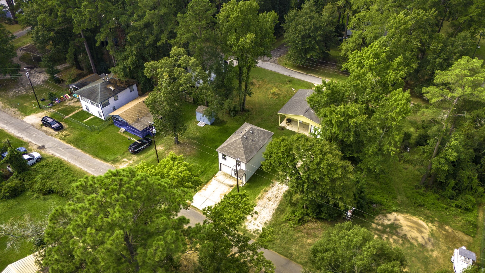 155 Cherry Tree Livingston, TX 77351 - Photo 20 of 30 an aerial view of residential house with outdoor space and trees all around