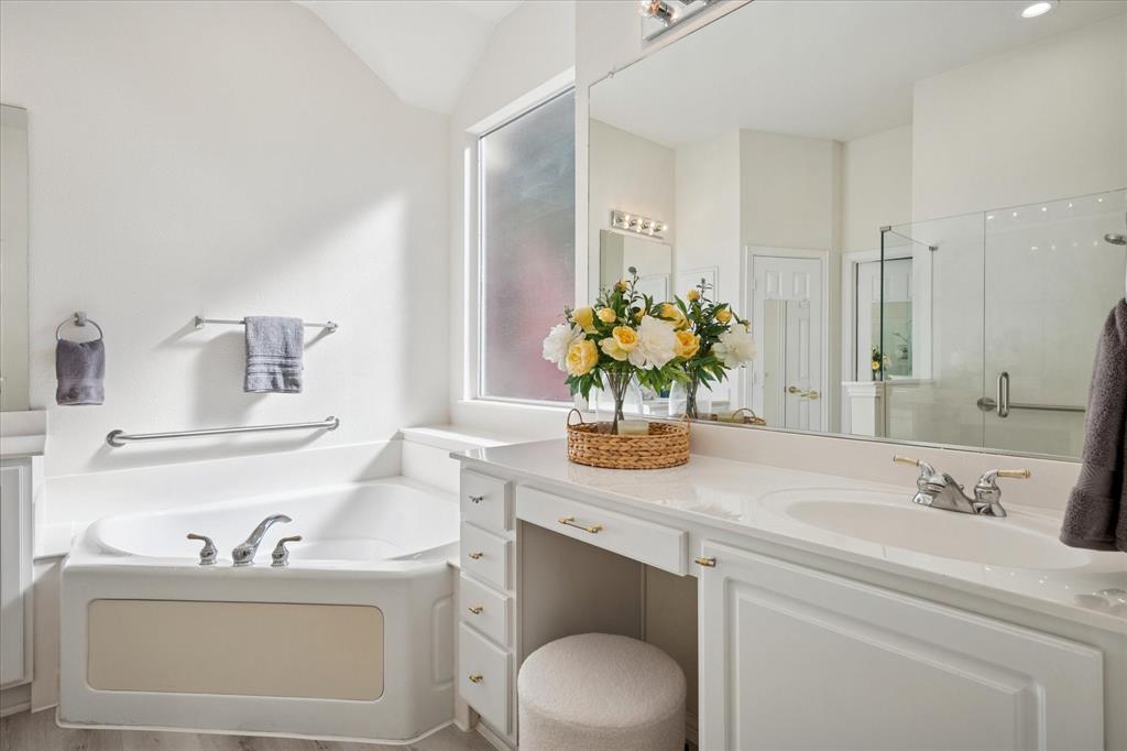 351 Rio Bravo Drive Fairview, TX 75069 - Photo 17 of 20 a bathroom with a sink toilet and a mirror