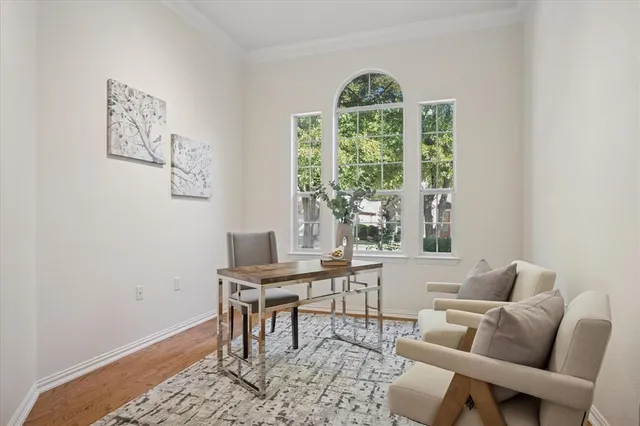 a workspace with furniture and a window