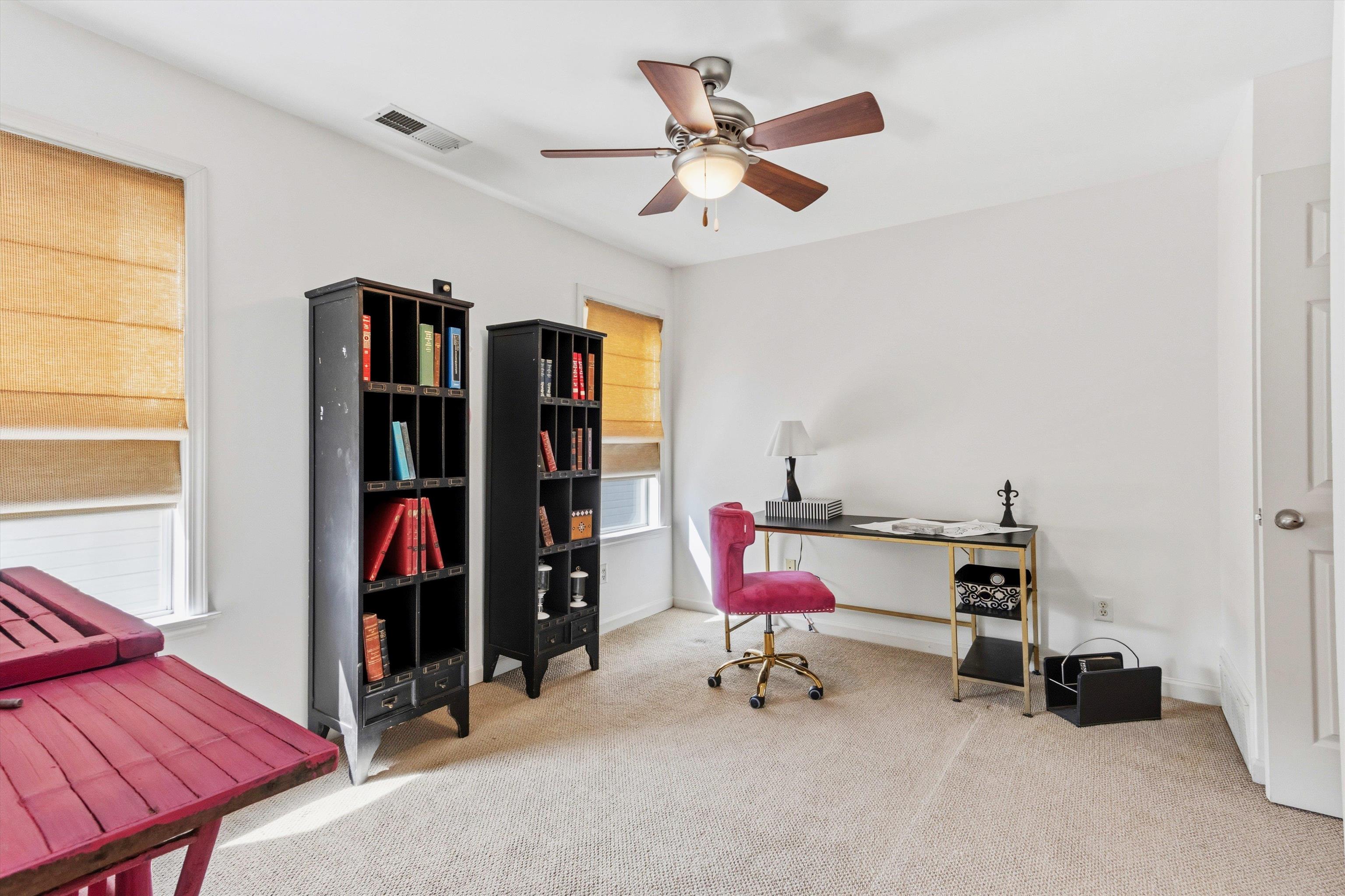 1182 Isle View Drive Memphis, TN 38103 - Photo 18 of 27 a view of a workspace with furniture and gym equipment