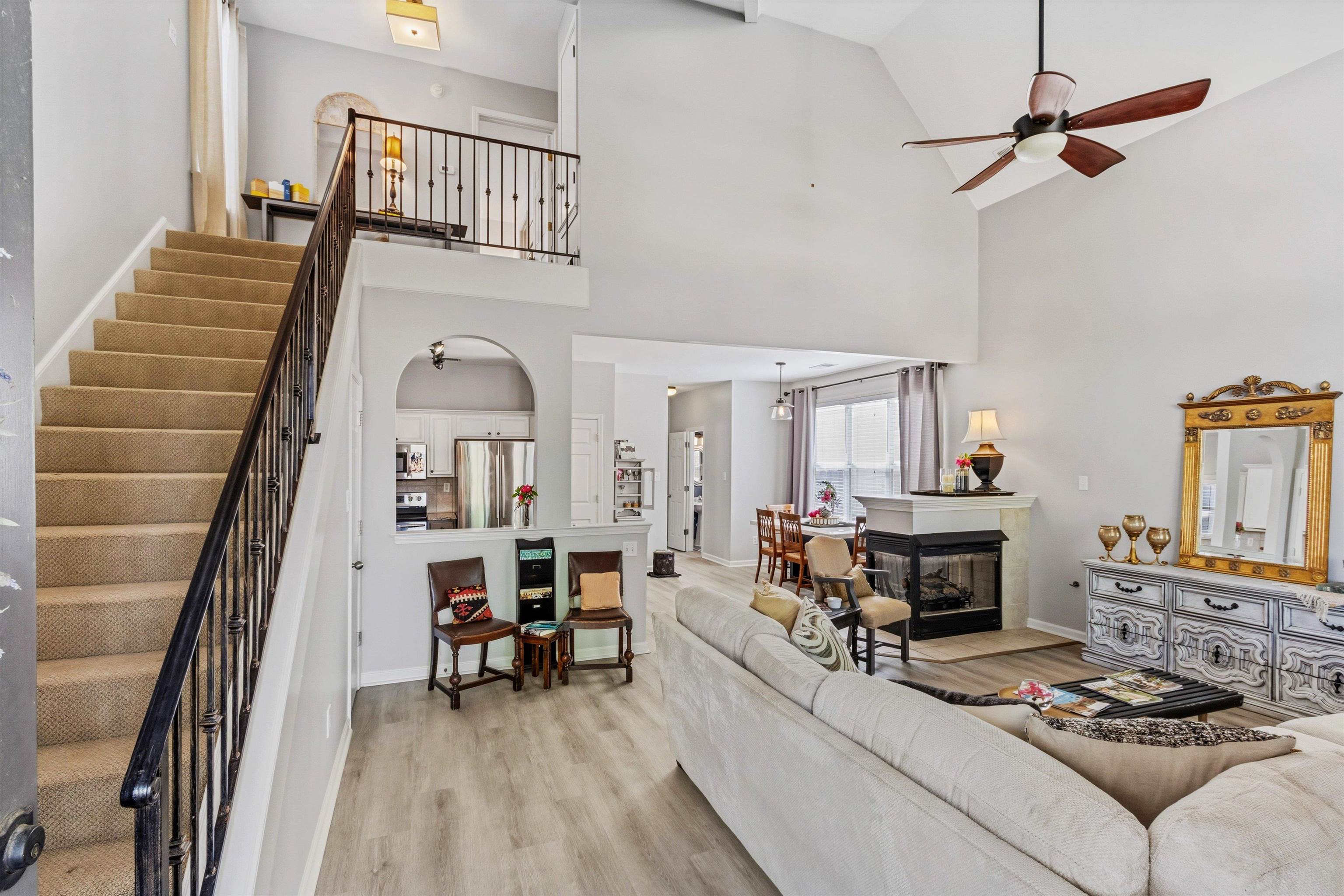 1182 Isle View Drive Memphis, TN 38103 - Photo 7 of 27 a living room with furniture and a fireplace