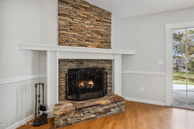 a living room with a fireplace