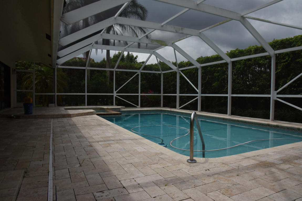 4465 Northwest 28th Way Boca Raton, FL 33434 - Photo 21 of 22 a view of a backyard