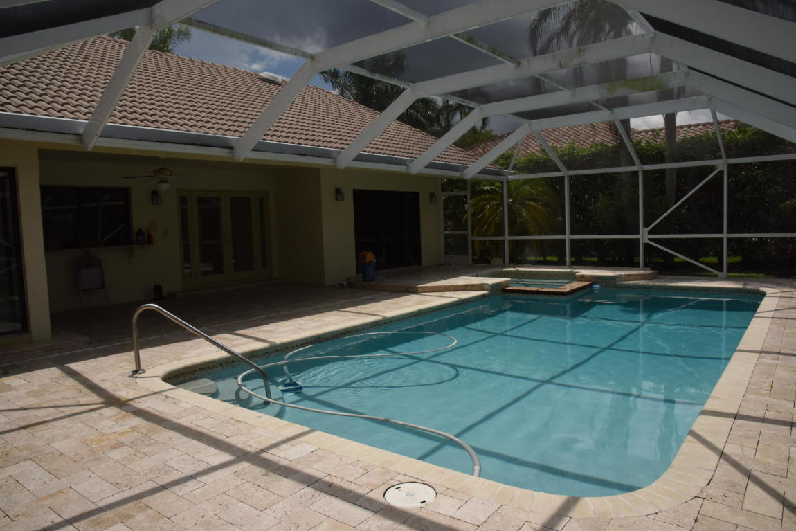 4465 Northwest 28th Way Boca Raton, FL 33434 - Photo 22 of 22 a view of a room with gym equipment