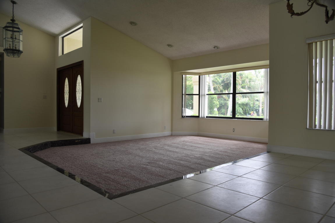 4465 Northwest 28th Way Boca Raton, FL 33434 - Photo 8 of 22 a view of an empty room and window