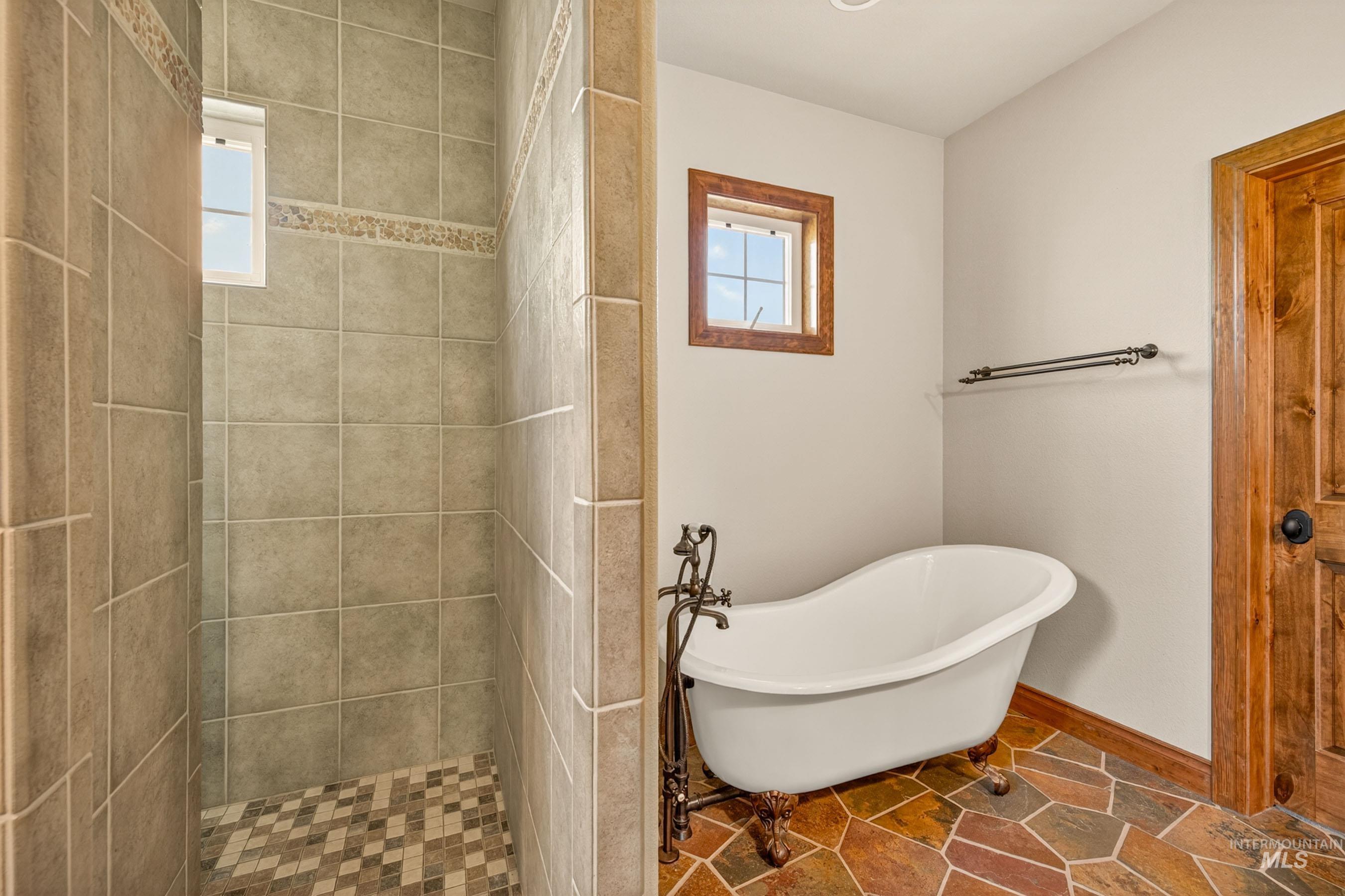 113 Deford Road White Bird, ID 83554 - Photo 21 of 49 Freestanding clawfoot tub with ornate bronze-finish hardware