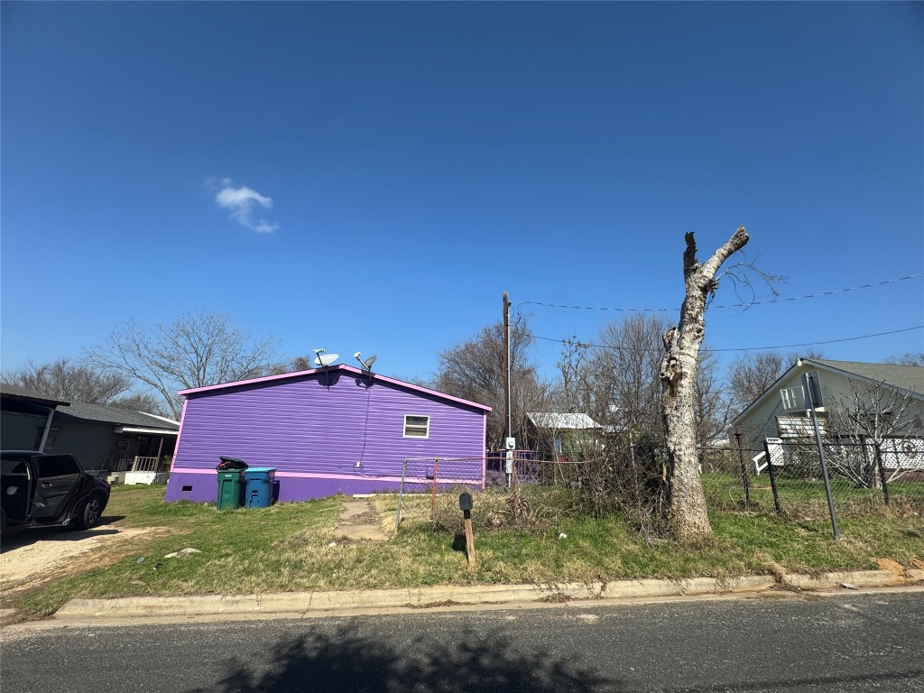 404 West Cleveland Street, Unit 1/2 Elgin, TX 78621 - Photo 8 of 23 View of home's exterior
