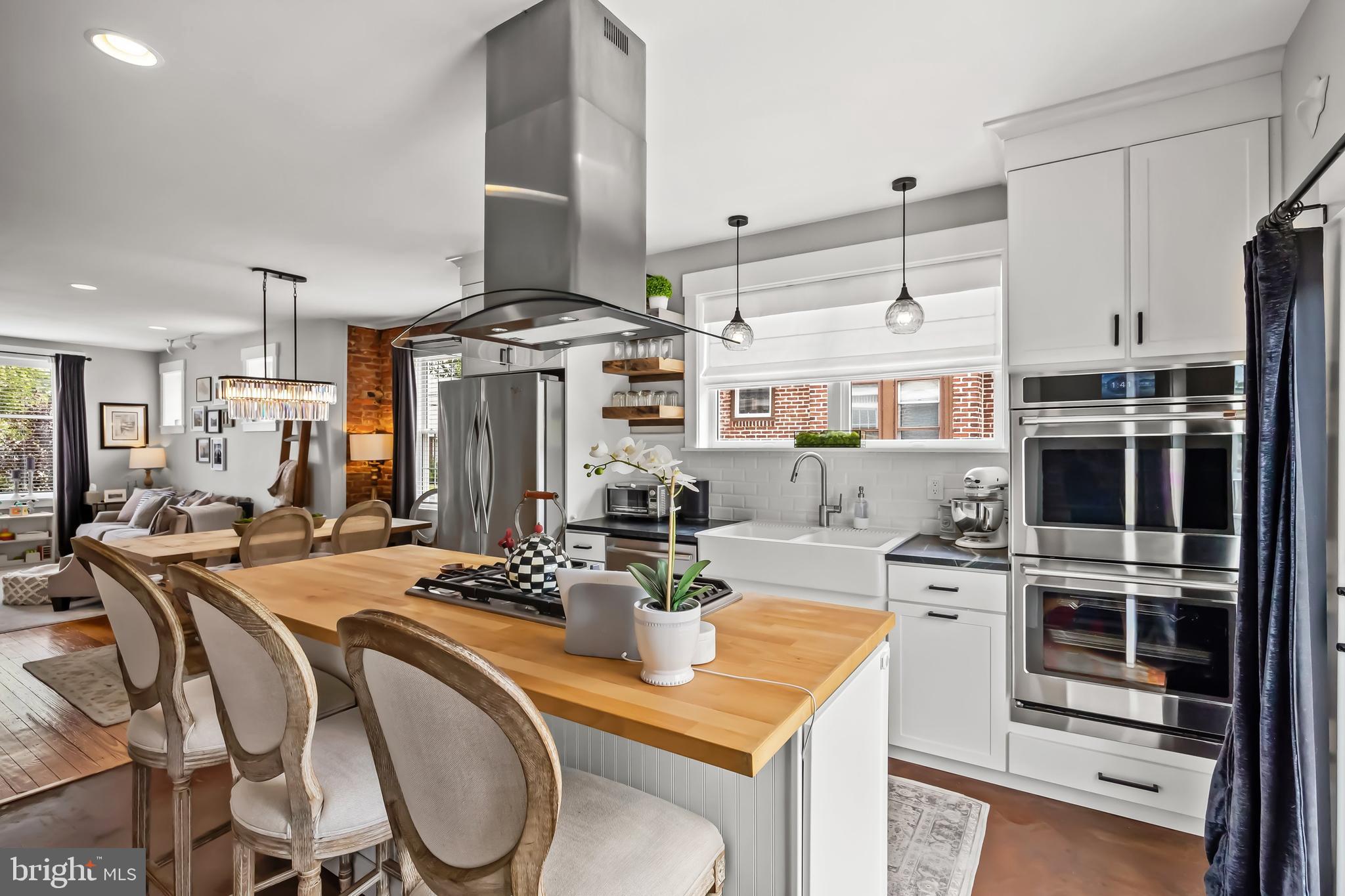 239 James Street Mount Ephraim, NJ 08059 - Photo 13 of 39 a kitchen with stainless steel appliances granite countertop a stove a sink and a refrigerator