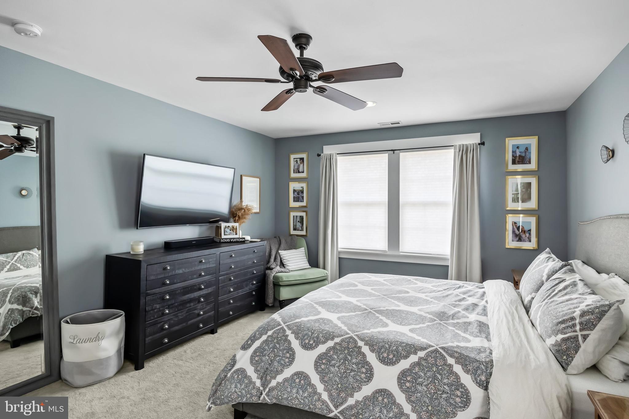 239 James Street Mount Ephraim, NJ 08059 - Photo 20 of 39 a bedroom with a bed and a flat screen tv