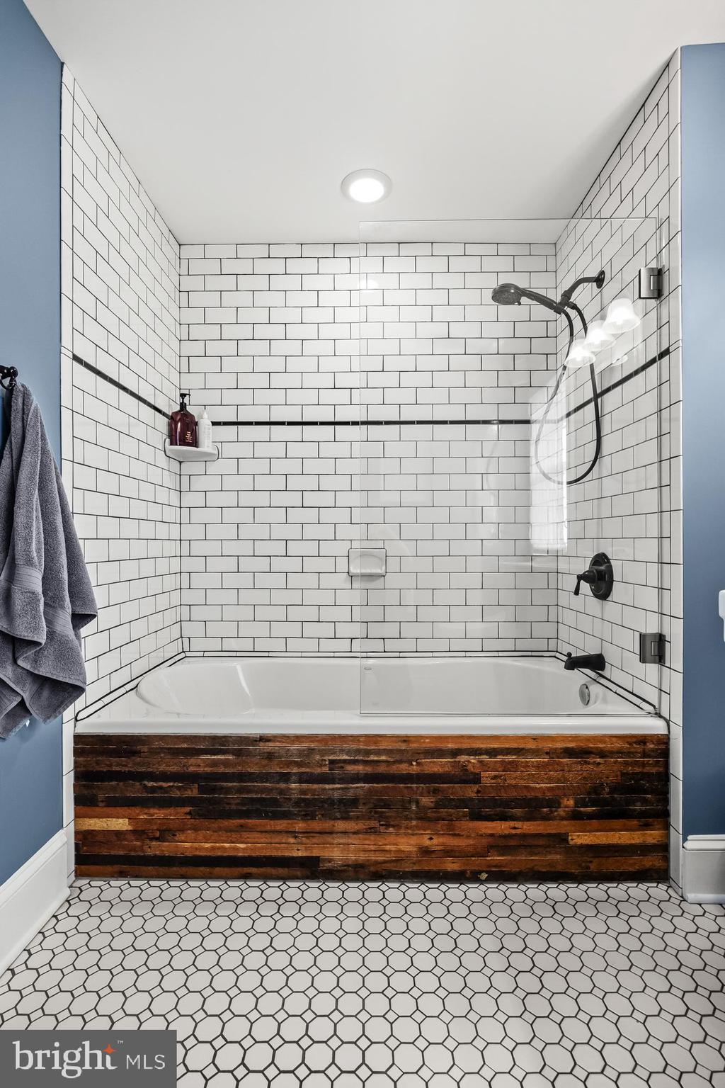 239 James Street Mount Ephraim, NJ 08059 - Photo 26 of 39 a bathroom with a bathtub and shower