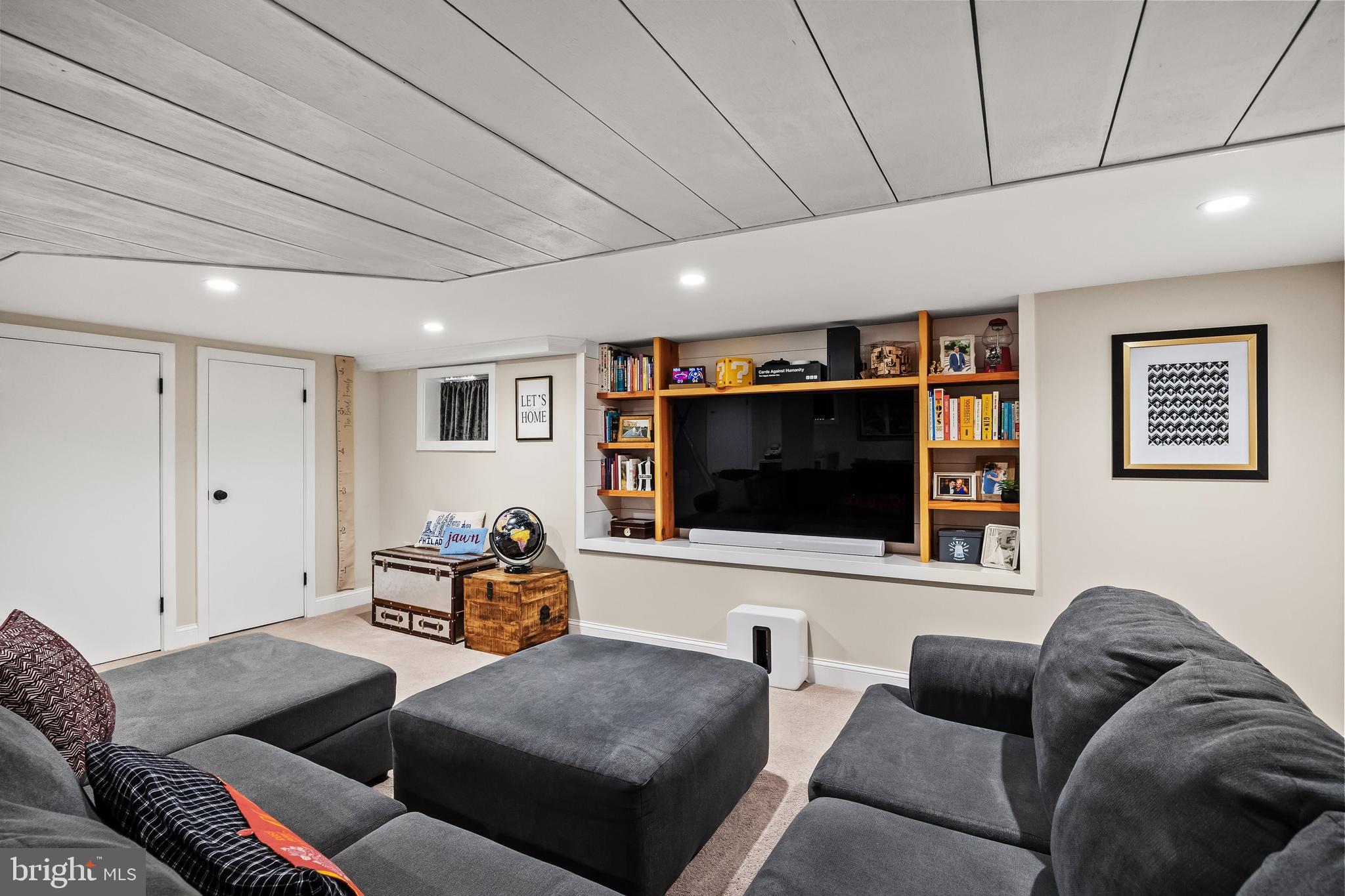 239 James Street Mount Ephraim, NJ 08059 - Photo 29 of 39 a living room with furniture and a flat screen tv