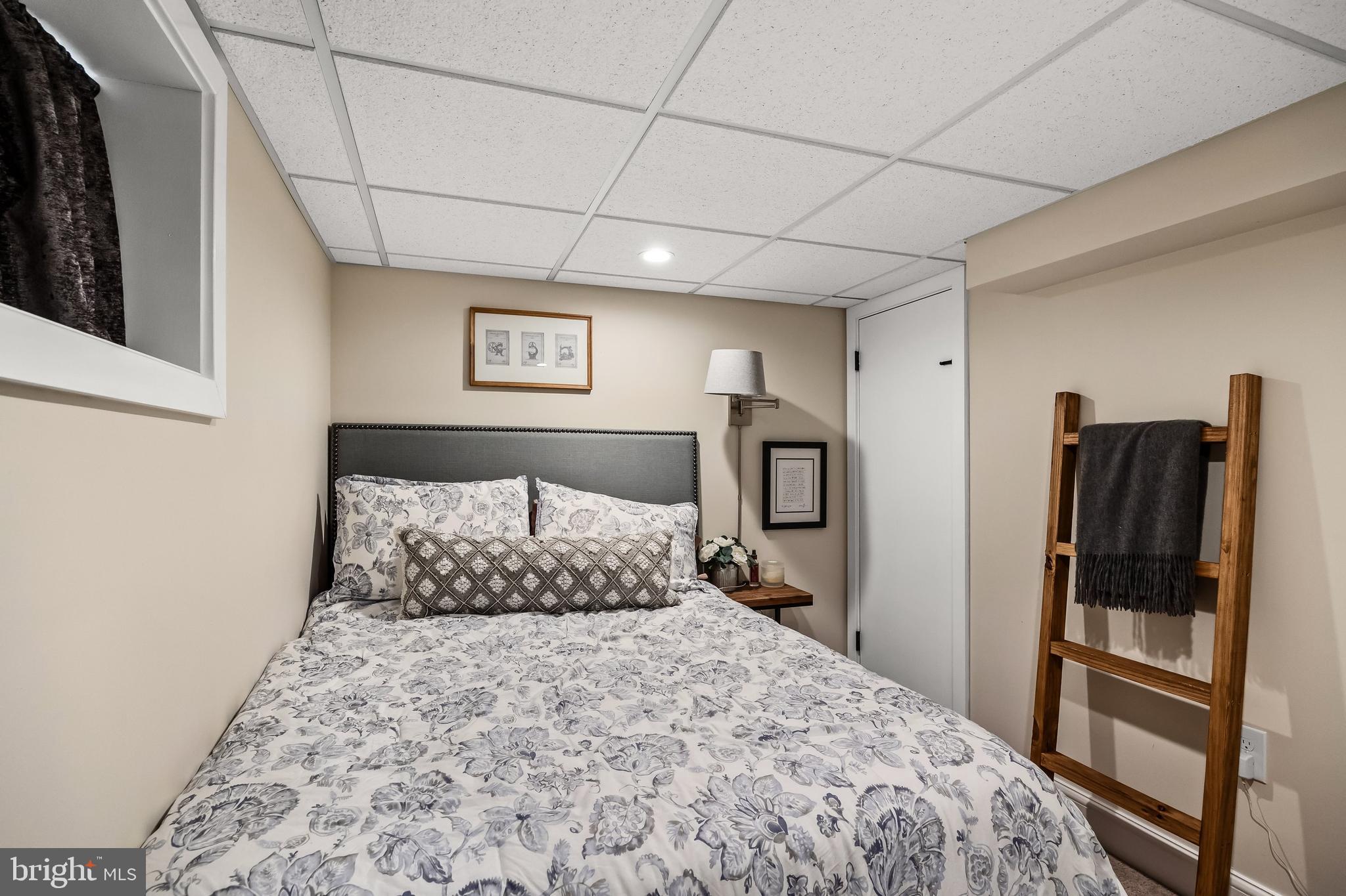 239 James Street Mount Ephraim, NJ 08059 - Photo 32 of 39 a bedroom with a bed and wooden floor