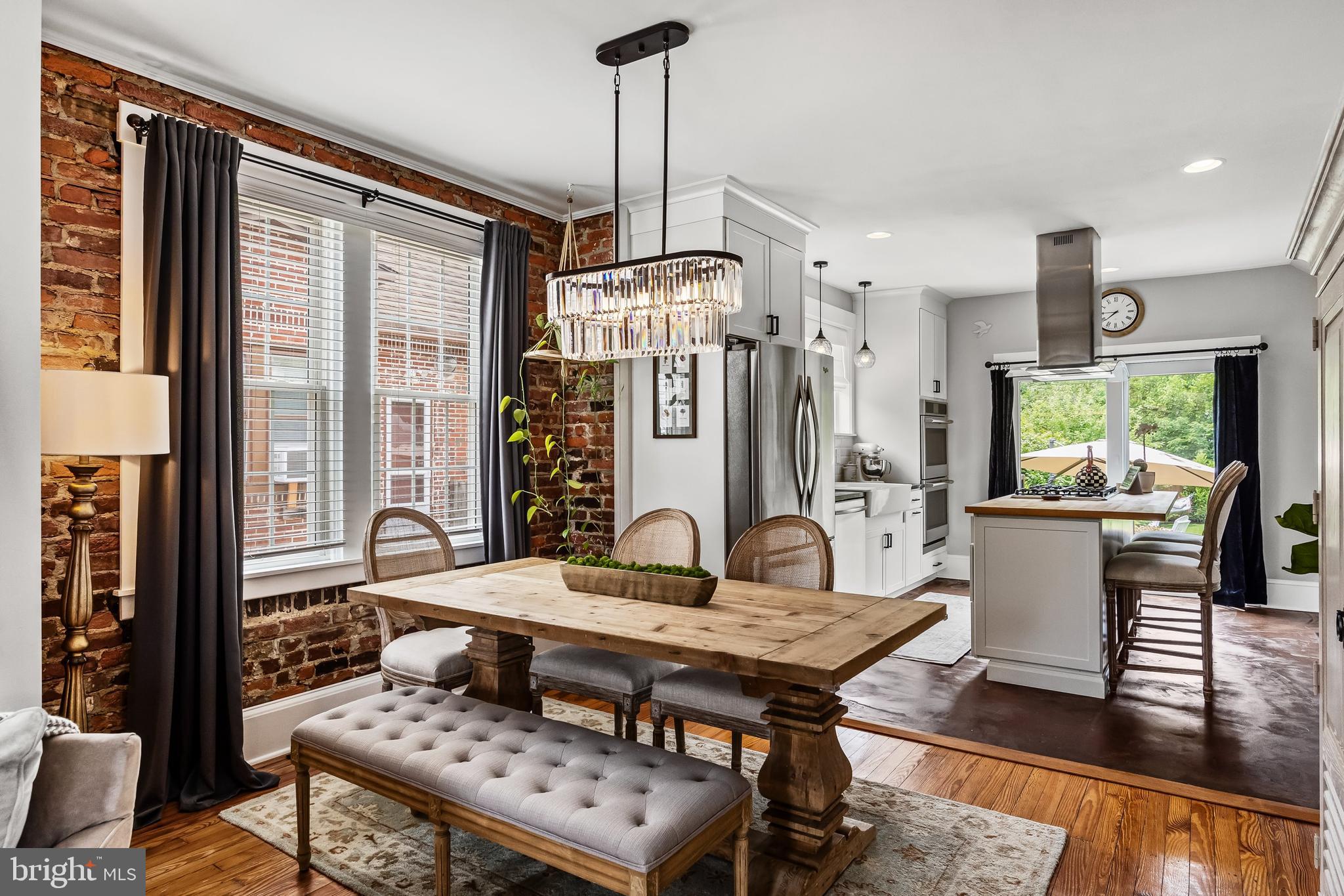 239 James Street Mount Ephraim, NJ 08059 - Photo 9 of 39 a living room with a table chairs and a dining table