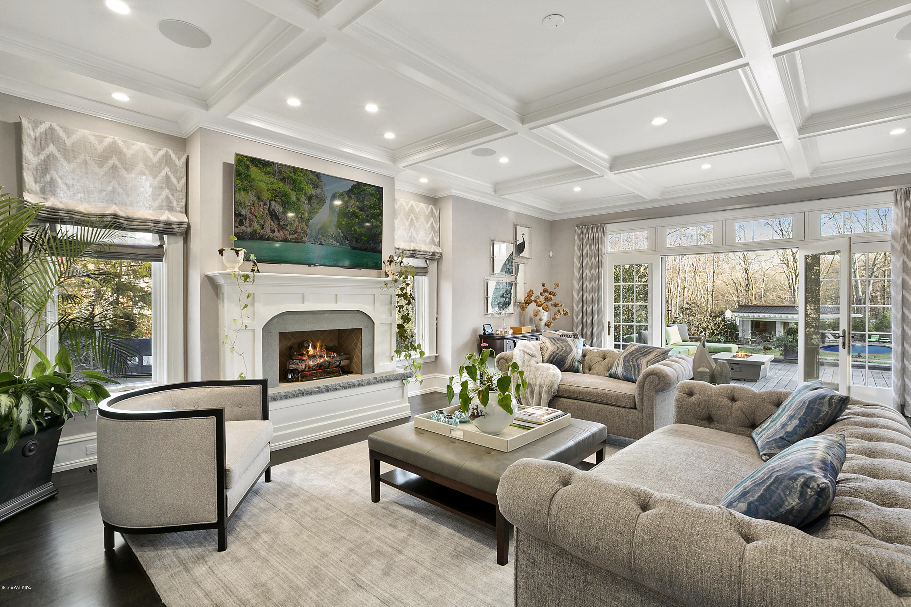 80 Howard Road Greenwich, CT 06831 - Photo 9 of 32 a living room with furniture and a fireplace
