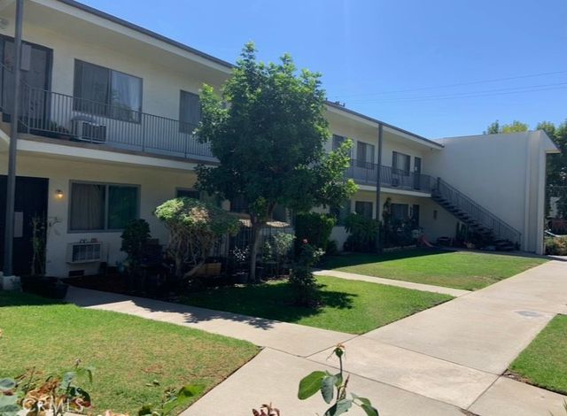 a house view with a garden space