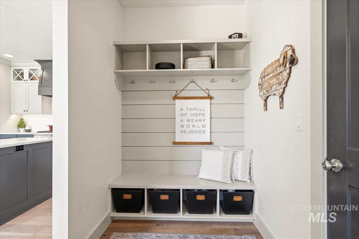 3794 South Single Tree Avenue Boise, ID 83716 - Photo 23 of 50 Built-in hall tree with integrated bench seating, cubby storage, and coat hooks