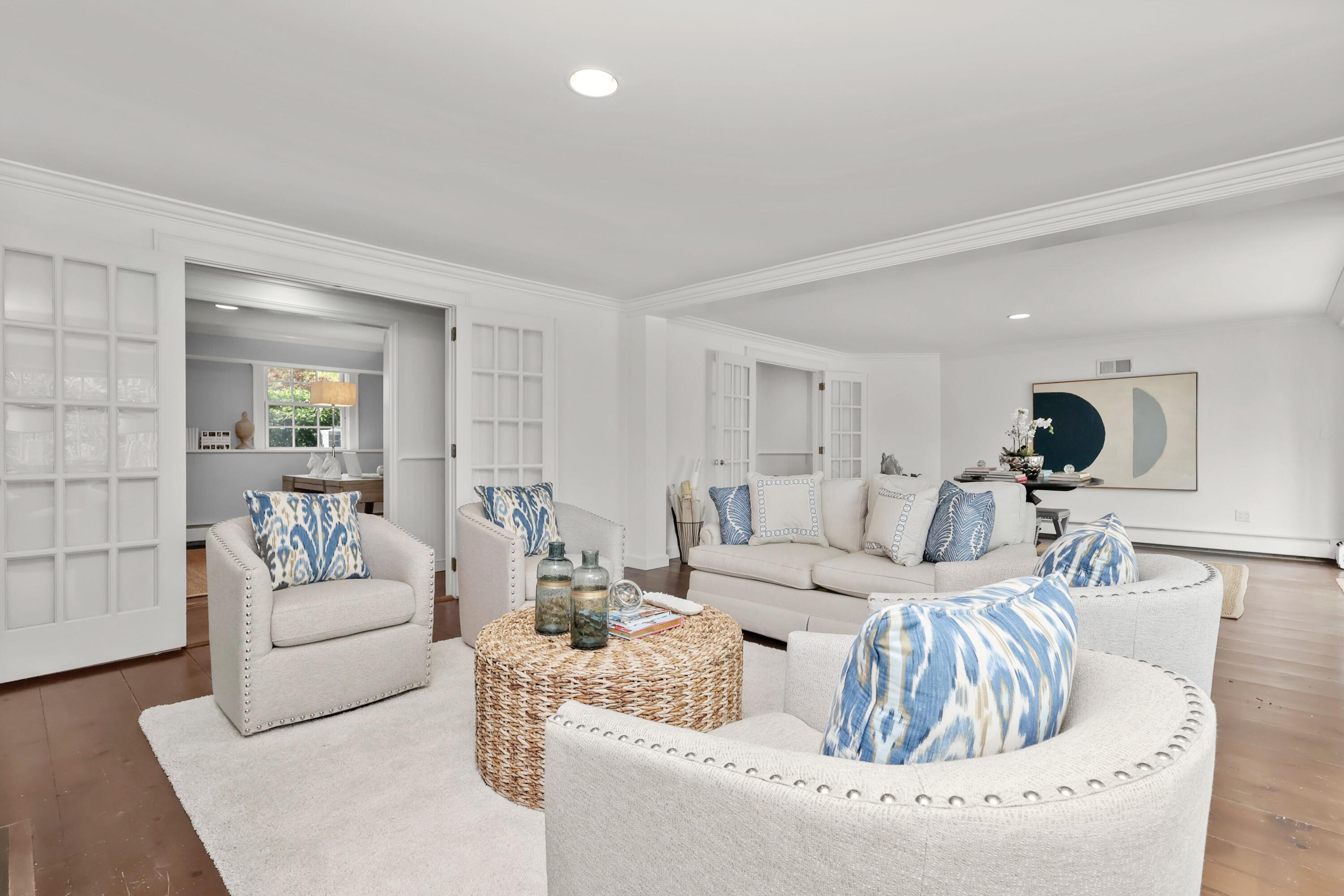203 Brushy Ridge Road New Canaan, CT 06840 - Photo 11 of 42 a living room with furniture and a couch