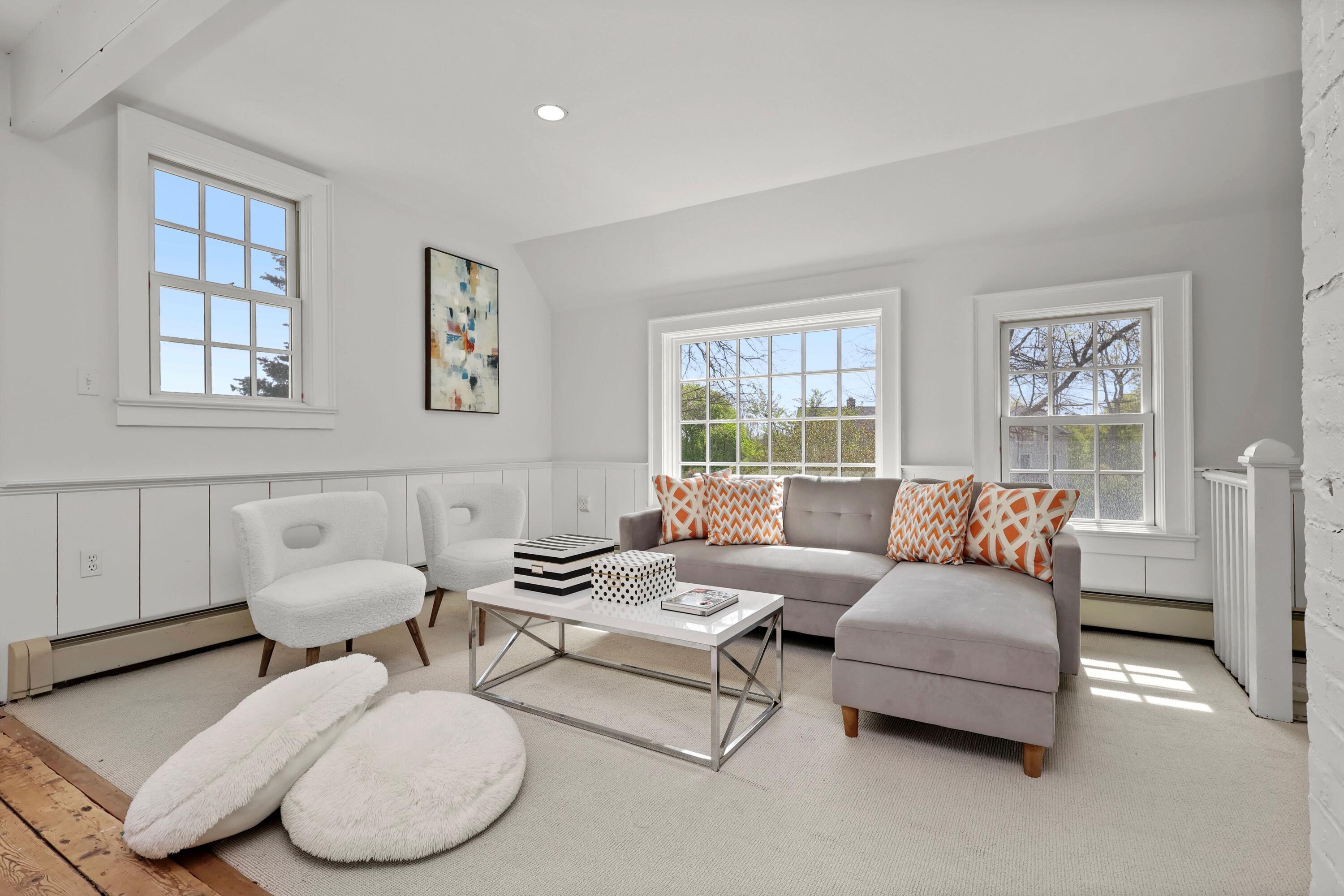 203 Brushy Ridge Road New Canaan, CT 06840 - Photo 17 of 42 a living room with furniture and a window