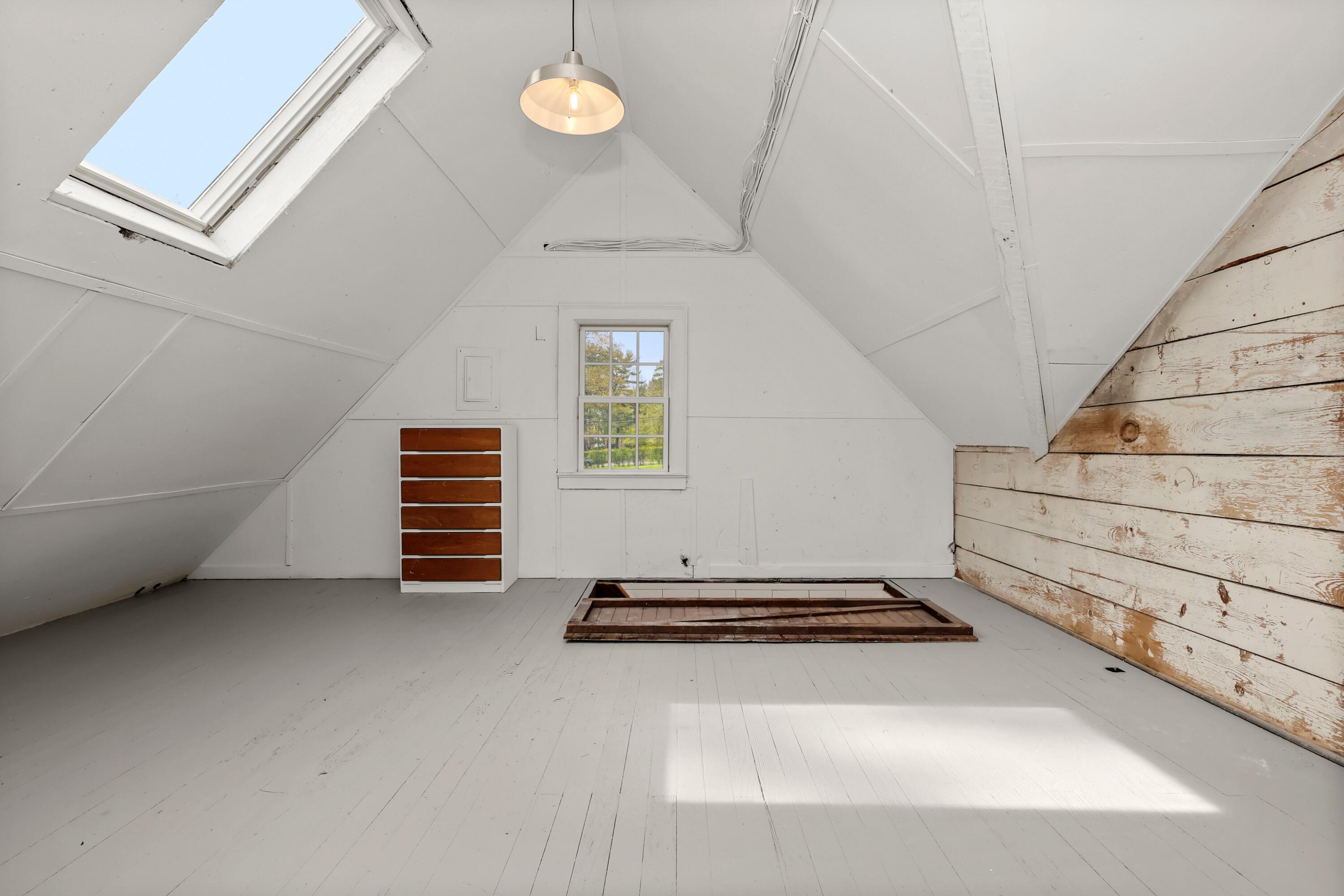 203 Brushy Ridge Road New Canaan, CT 06840 - Photo 35 of 42 a view of room with stairs and a window