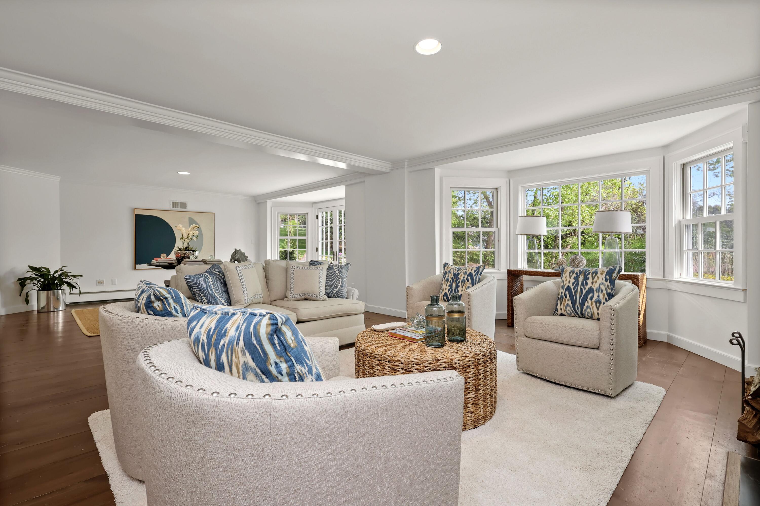 203 Brushy Ridge Road New Canaan, CT 06840 - Photo 9 of 42 a living room with furniture and a large window