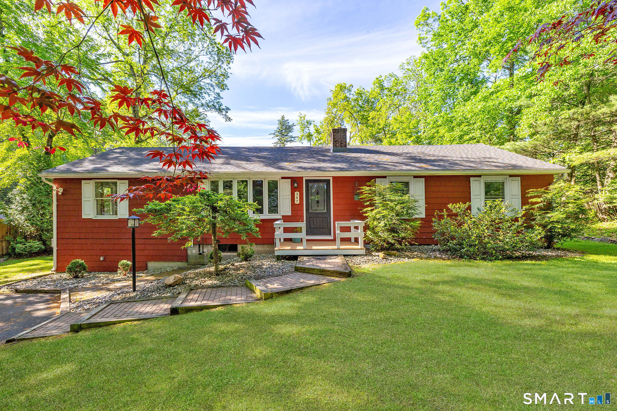 347 Griffin Road Suffield, CT 06093 - Photo 1 of 35 a house view with a sitting space and garden
