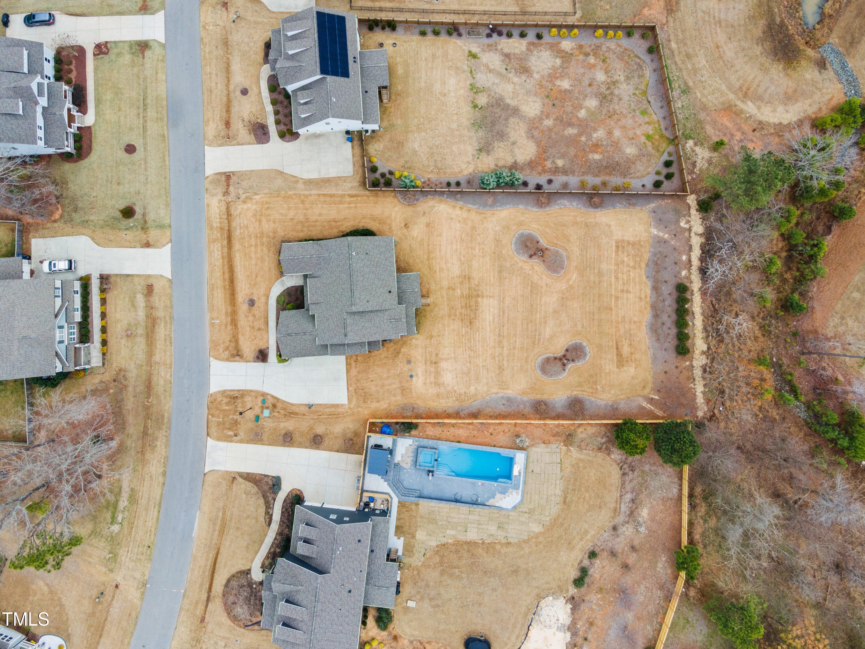 2025 Braeburn Drive Apex, NC 27539 - Photo 69 of 71 an aerial view of residential houses with outdoor space