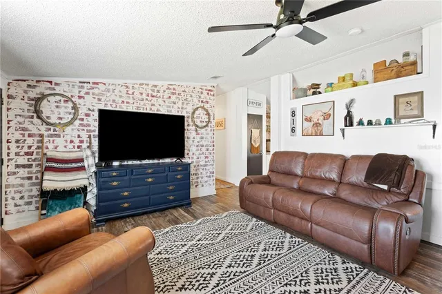a living room with furniture and a rug