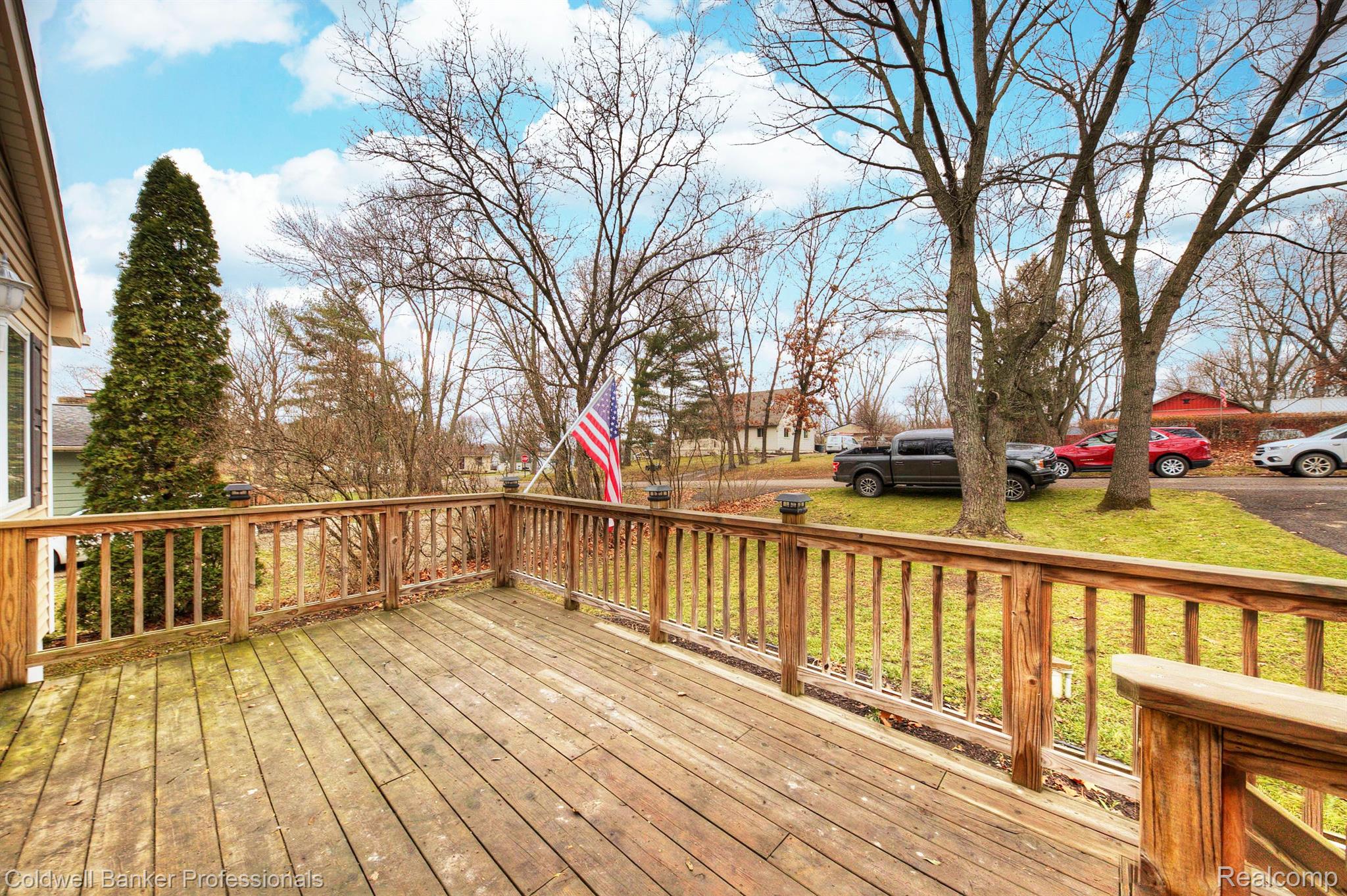 585 Fisher Road Highland, MI 48357 - Photo 2 of 23 Large front deck.