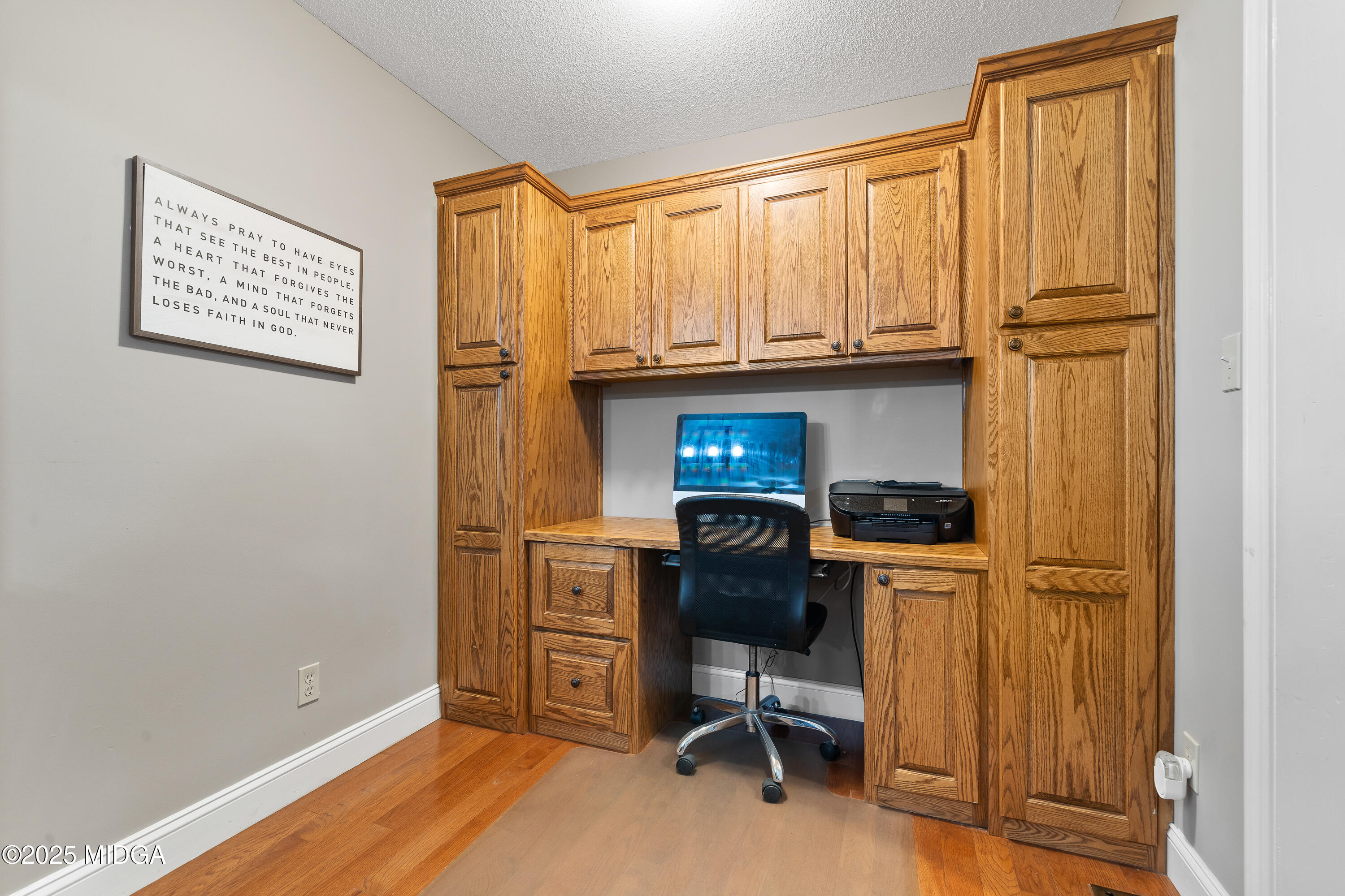 299 Colvin Road Forsyth, GA 31029 - Photo 17 of 51 a view of workspace with windows